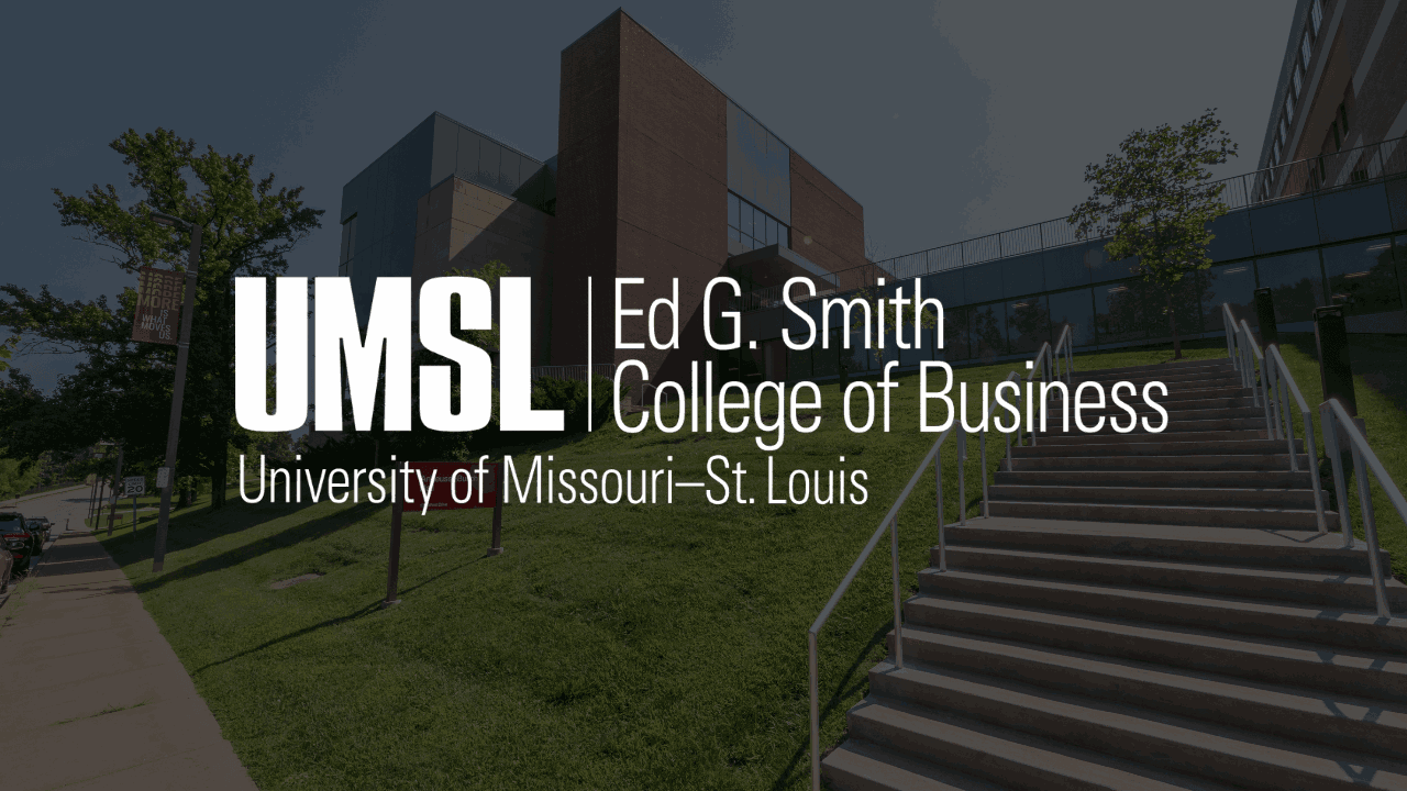 a campus building with a logo over it